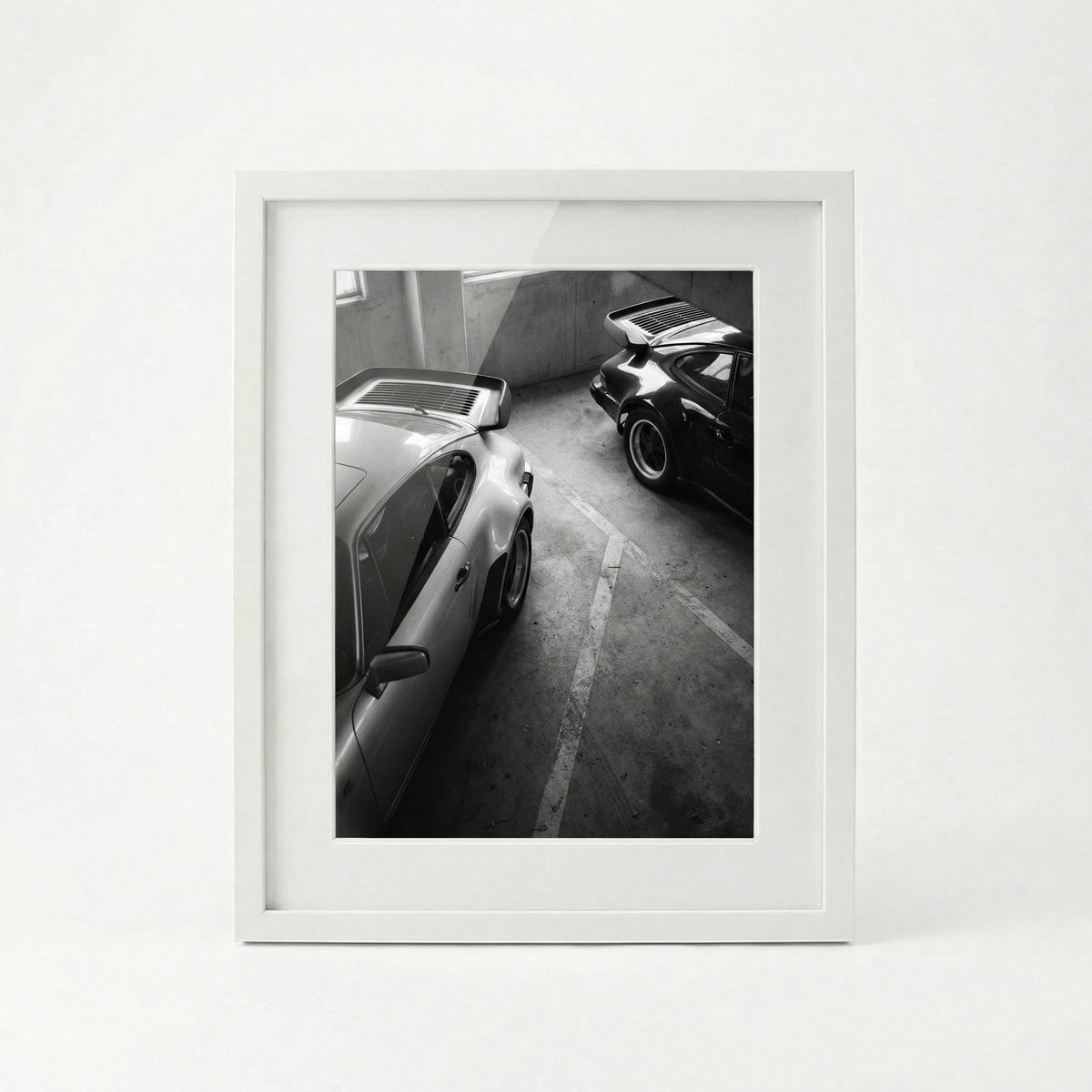 Garage Nocturne, framed and styled in a room