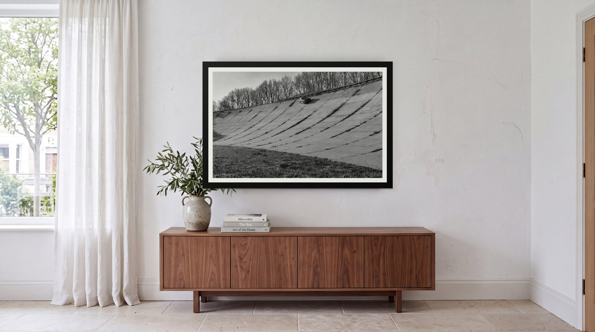 Banking, framed in black with a white mat on a wall at home