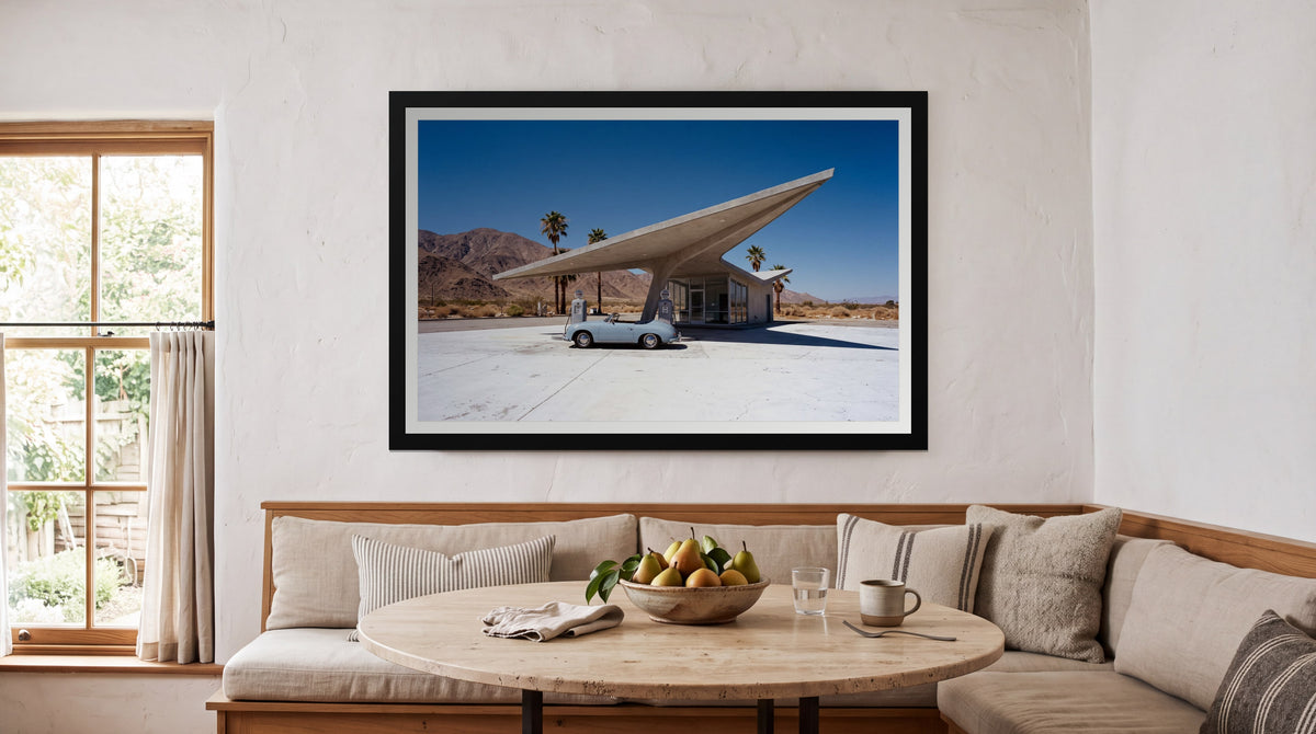 Canopy, framed in black with a white mat on a wall at home