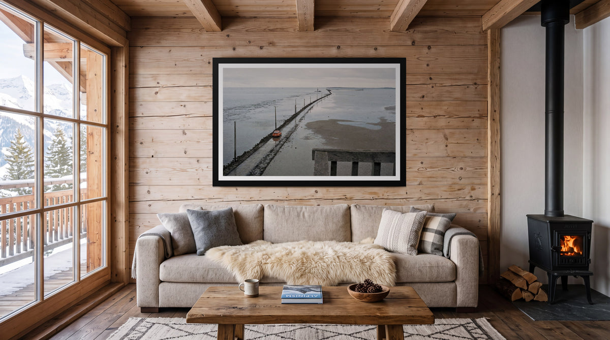 Causeway, framed in black with a white mat on a wall at home