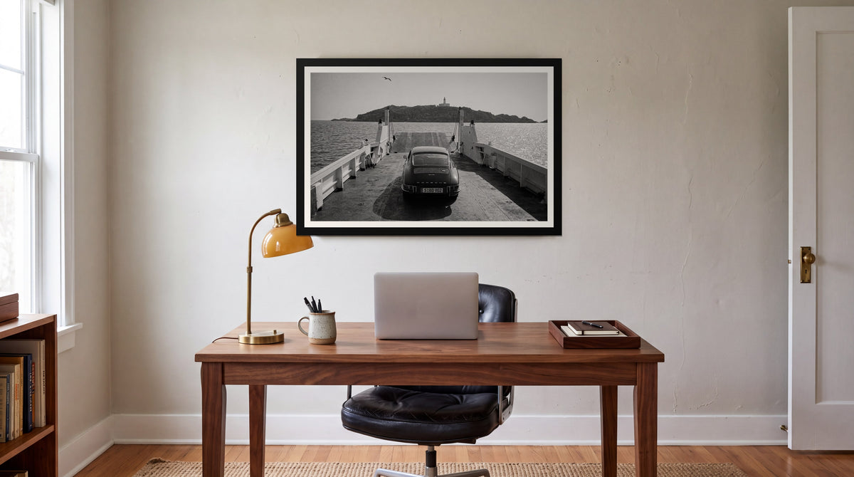 Crossing, framed in black with a white mat on a wall at home