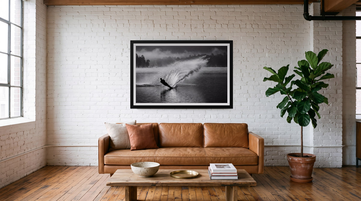 Curtain, framed in black with a white mat on a wall at home