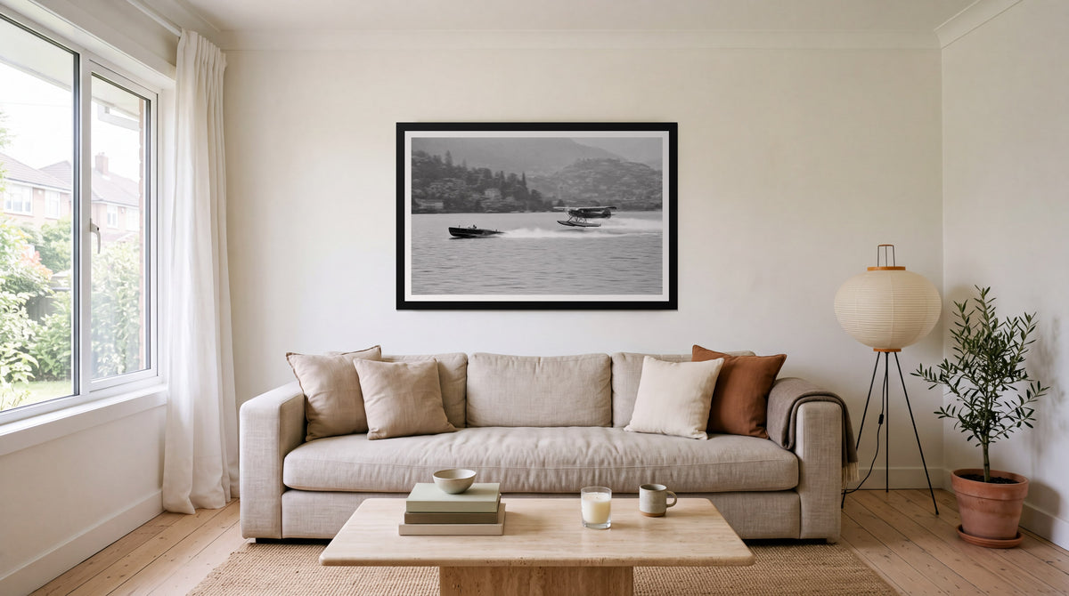 Dead Heat, framed in black with a white mat on a wall at home