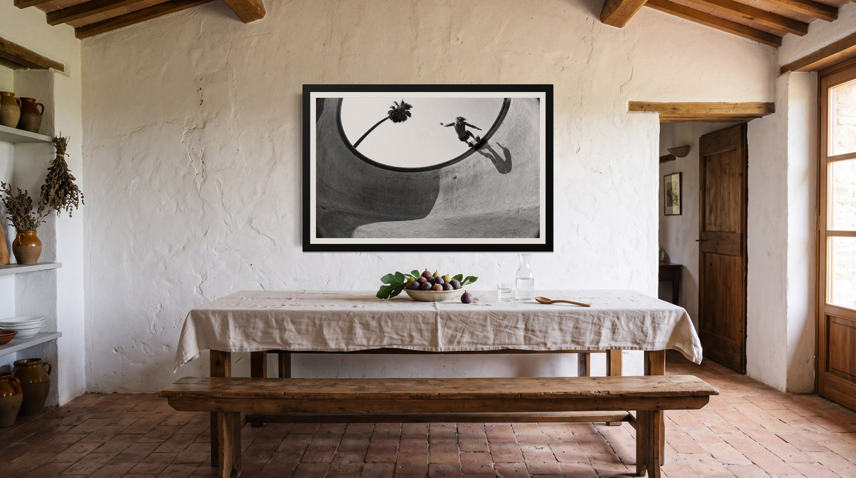Dry Season, framed in black with a white mat on a wall at home