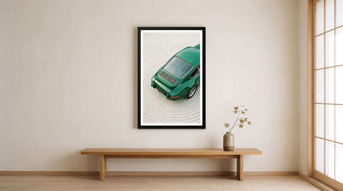 Raked Sand 911, Green Porsche 911 Zen Garden, framed in black with a white mat on a wall at home