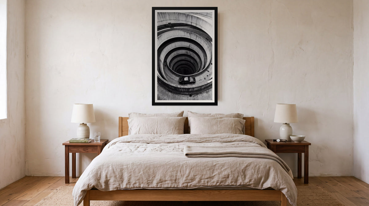 Spiral, framed in black with a white mat on a wall at home