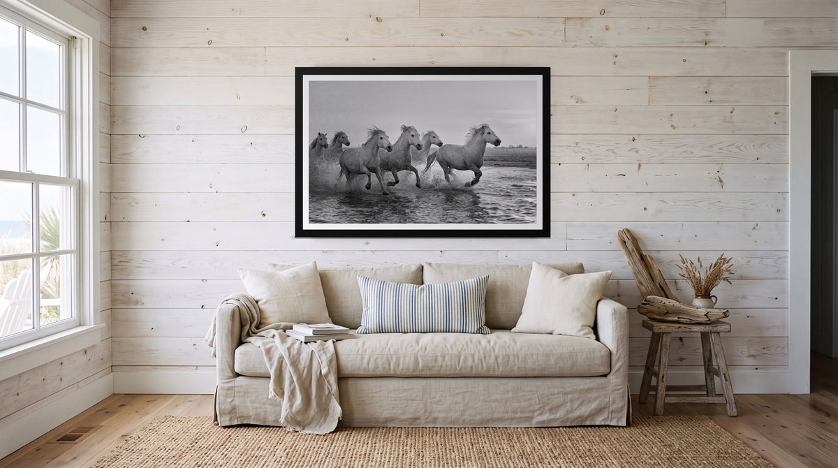 White Horses, framed in black with a white mat on a wall at home