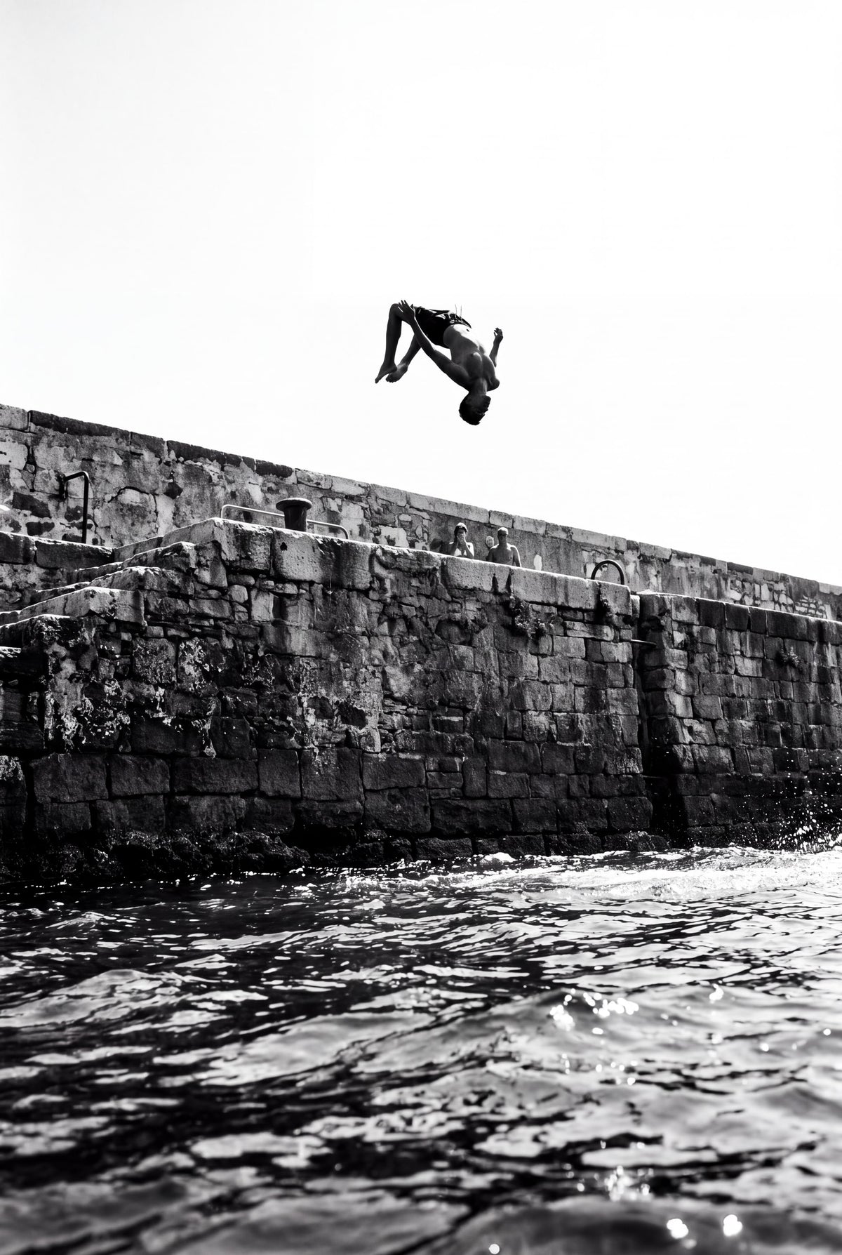 Backflip: backflip off a harbour wall black & white art print